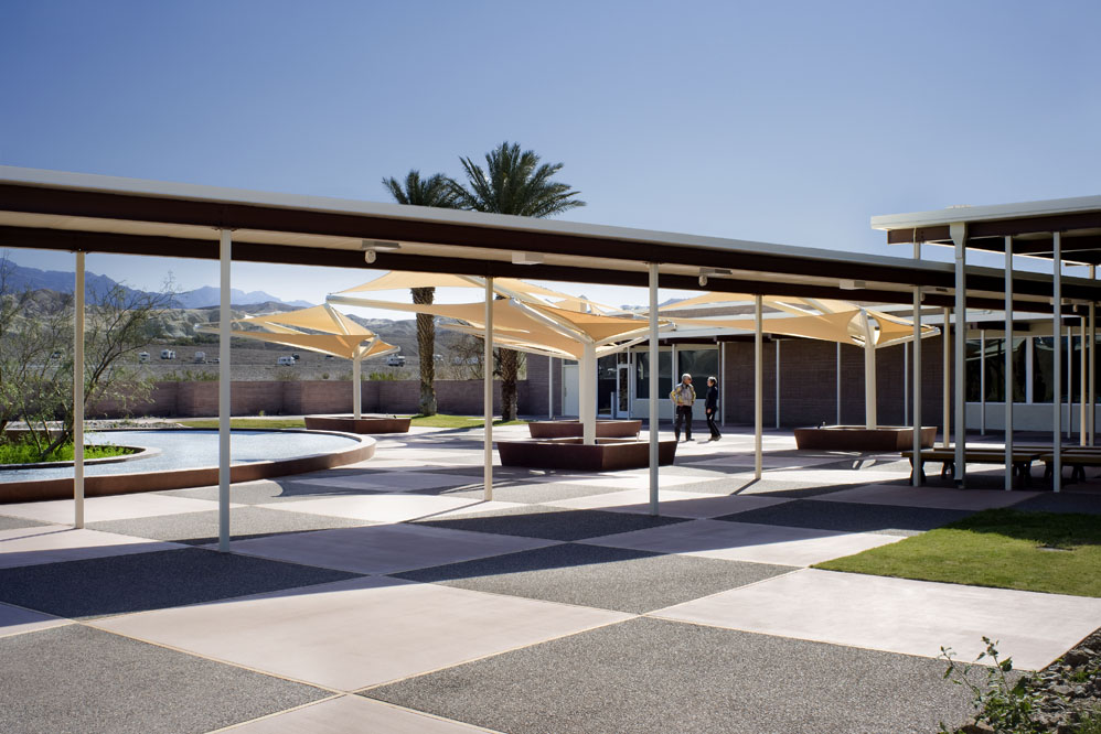 Courtyard with historic pool and new fabric shade structures