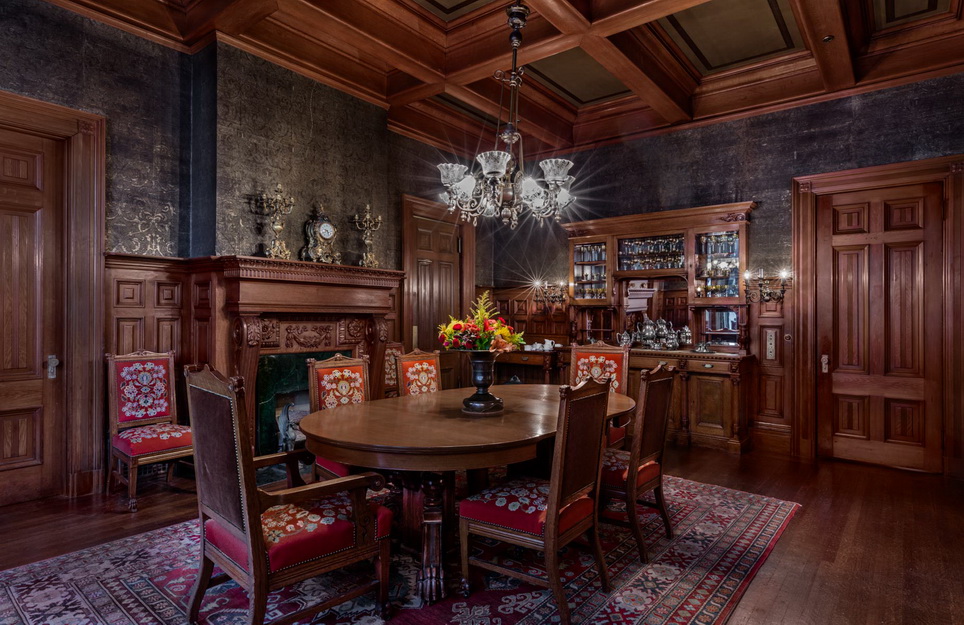 Image of the interior dinning room, dark wood features inside Hass Lilenthal