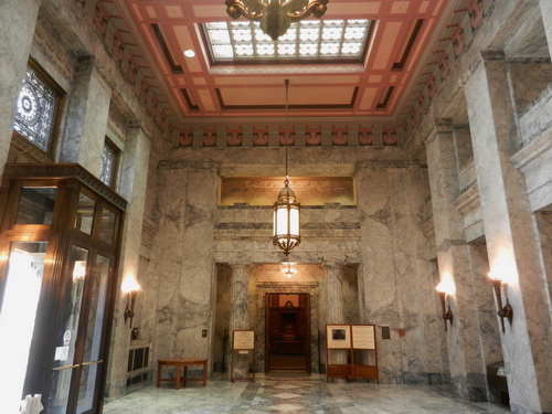 Interior image of an entrance lobby dim lit